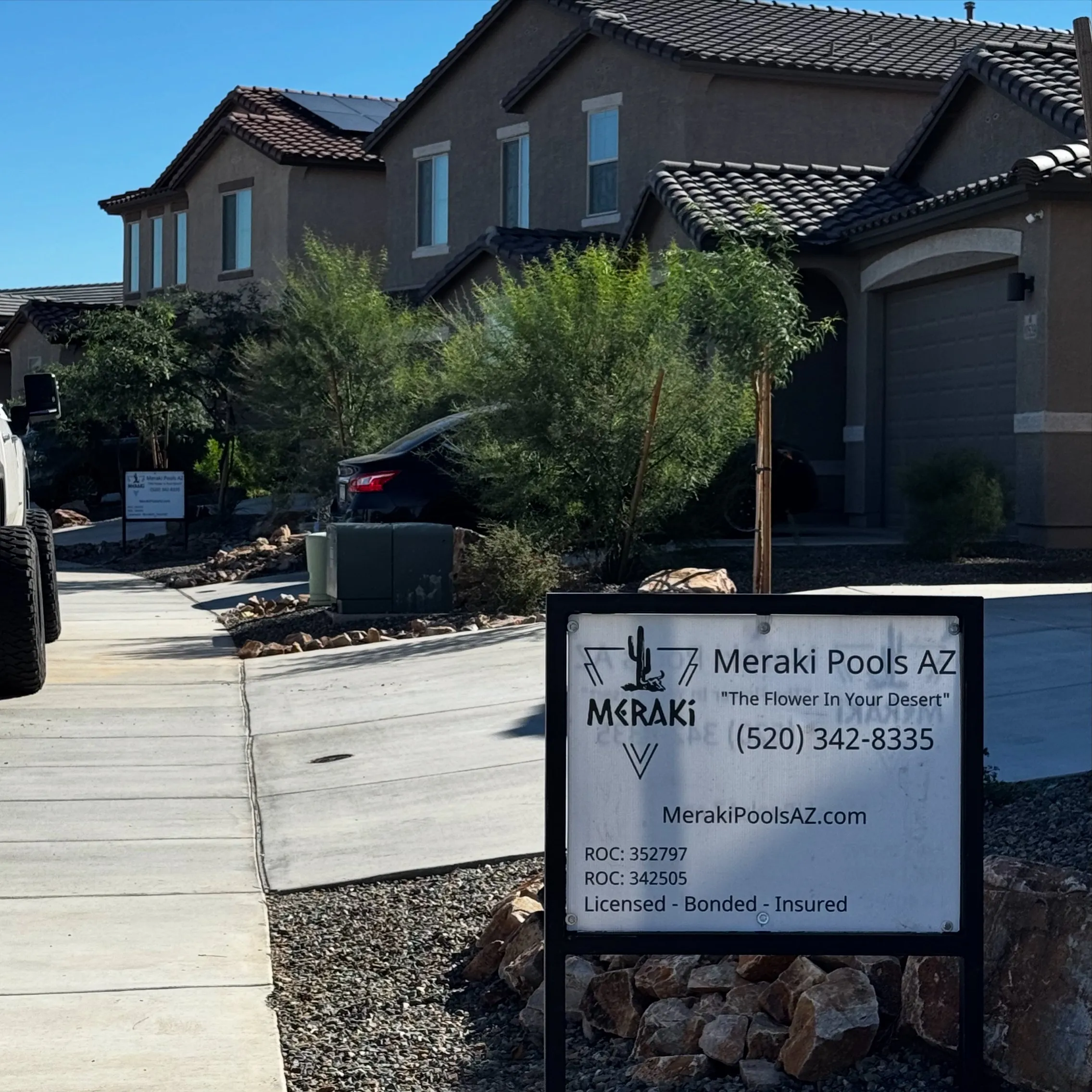 Meraki Pools AZ job-site sign in front of a home in a Marana neighborhood